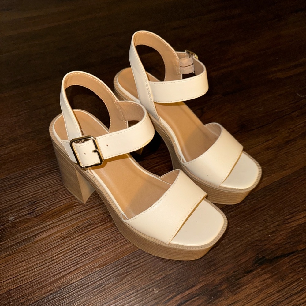 White platform sandals with wooden heels